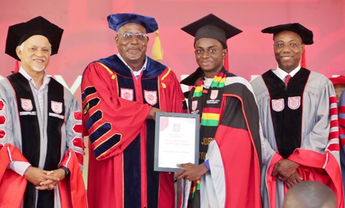 Prof. Fred McBagonluri (2nd from left), Founding President, Academic City University, presenting the overall best student award to Joseph Apiriala-Ateboghu (2nd from right), the valedictorian. Picture: ELVIS NII NOI DOWUONA Prof. Fred McBagonluri (2nd from left), Founding President, Academic City University, presenting the overall best student award to Joseph Apiriala-Ateboghu (2nd from right), the valedictorian. Picture: ELVIS NII NOI DOWUONA
