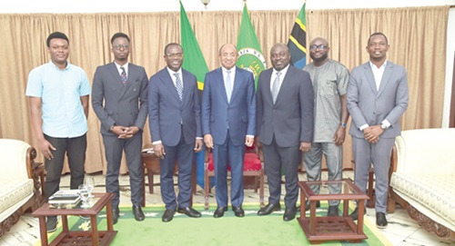 Joseph Siaw Agyepong (3rd from left) with  President Hussein Ali Mwinyi (middle) and other officials