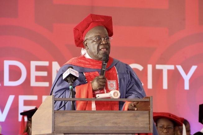 Prof. Fred McBagonluri (2nd from left), Founding President, Academic City University, presenting the overall best student award to Joseph Apiriala-Ateboghu (2nd from right), the valedictorian. Picture: ELVIS NII NOI DOWUONA
