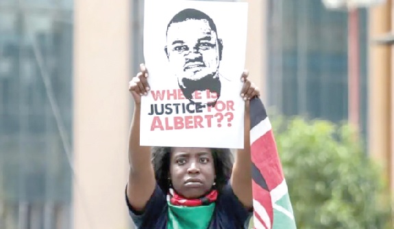 A woman holding a picture of Albert Ojwang, the Kenyan blogger who died while being held at a police station in Nairobi A woman holding a picture of Albert Ojwang, the Kenyan blogger who died while being held at a police station in Nairobi