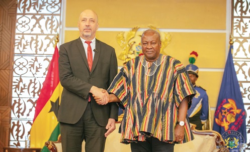President John Mahama posing for the cameras with Antit Mohsen, Ambassador of the Republic of Tunisia, after receiving his credentials