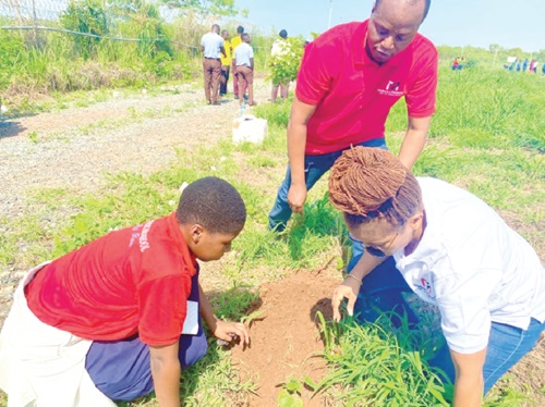 Esi Ribeiro (right), ESG Advisor, MAP, in a tree planting exercise with Mr Addico (middle), Advisory Partner, MAP, and a student from Mothercare International School Esi Ribeiro (right), ESG Advisor, MAP, in a tree planting exercise with Mr Addico (middle), Advisory Partner, MAP, and a student from Mothercare International School