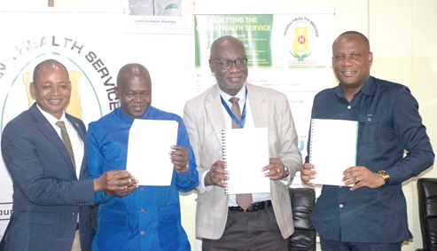 Dr Divine Banyubala (left), Registrar, Medical and Dental Council, Prof. Samuel Kaba Akoriyea (2nd from left), Director General, GHS, Prof. Richard Adanu (2nd from right), Rector, Ghana College of Physicians and Surgeons, and Prof. Albert Luguterah (right), Vice Chancellor, CK Tedam University of Technology and Applied Sciences, displaying the signed MoU Dr Divine Banyubala (left), Registrar, Medical and Dental Council, Prof. Samuel Kaba Akoriyea (2nd from left), Director General, GHS, Prof. Richard Adanu (2nd from right), Rector, Ghana College of Physicians and Surgeons, and Prof. Albert Luguterah (right), Vice Chancellor, CK Tedam University of Technology and Applied Sciences, displaying the signed MoU