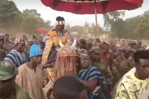 The Ya-Na riding a horse to the Eid praying ground The Ya-Na riding a horse to the Eid praying ground