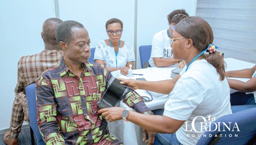A beneficiary (left) being attended to