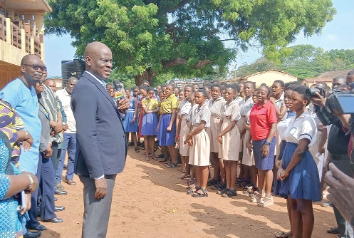 Haruna Iddrisu (left), Education Minister, addressing BECE candidates at the St Paul Basic School at La, in Accra