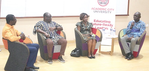 Kofi Yeboah (right), General Secretary, GJA, in a panel discussion with Awola Serwaa (2nd from right), legal practitioner, and Michael Ali (2nd from left), Head of Mining, EPA. Moderating is Michael Yamoah (left), Media practitioner and lecturer, Academic City College. Picture:  ERNEST KODZI