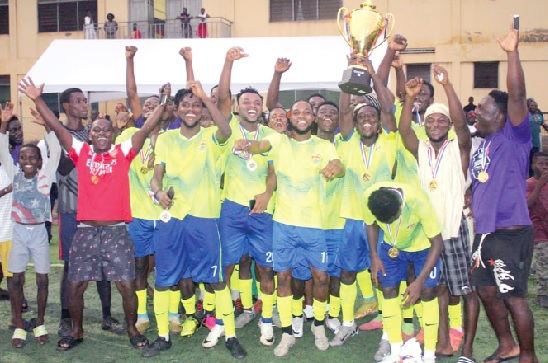 Players and supporters of Community 2 Sakasaka celebrating with the winner's trophy Players and supporters of Community 2 Sakasaka celebrating with the winner's trophy