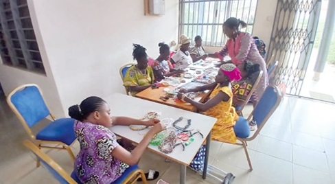 Some of the women with disability busily learning how to make jewellery at Nkurakan Some of the women with disability busily learning how to make jewellery at Nkurakan