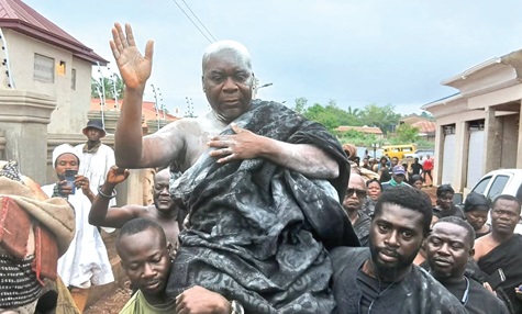 Ofentemfrem Omenasono Dr Bosoma Asor Nkrawiri III, the latest installed chief, being carried through the principal street Ofentemfrem Omenasono Dr Bosoma Asor Nkrawiri III, the latest installed chief, being carried through the principal street