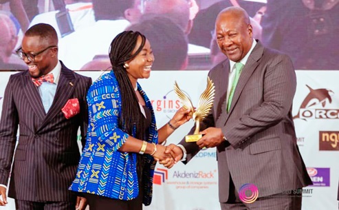 Grace Arthur (left), Country Representative and Consultant for Henley & Partners, receiving her honour from President John Dramani Mahama Grace Arthur (left), Country Representative and Consultant for Henley & Partners, receiving her honour from President John Dramani Mahama