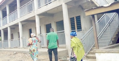 Manye Maku I (left), Manya Krobo Divisional Queenmother, leading some visitors round the project Manye Maku I (left), Manya Krobo Divisional Queenmother, leading some visitors round the project