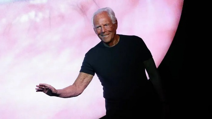 Armani usually appears at the end of his shows - as pictured here in Milan last year Armani usually appears at the end of his shows - as pictured here in Milan last year