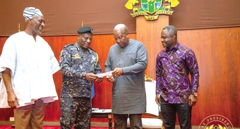 COP Christian Tetteh Yohuno (2nd from left), IGP, presenting the cheque to President John Mahama. With them are Muntaka Mohammed Mubarak (left), Minister for the Interior, and Kwabena Mintah Akandoh, Minister of Health COP Christian Tetteh Yohuno (2nd from left), IGP, presenting the cheque to President John Mahama. With them are Muntaka Mohammed Mubarak (left), Minister for the Interior, and Kwabena Mintah Akandoh, Minister of Health
