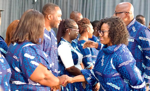 Florence Hutchful (2nd from right), President, Chartered Institute of Human Resource Management, shaking hands with the newly inducted members of the Institute Florence Hutchful (2nd from right), President, Chartered Institute of Human Resource Management, shaking hands with the newly inducted members of the Institute
