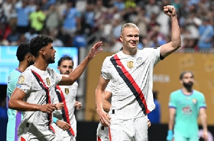 Erling Haaland celebrates with Matheus Nunes after scoring Manchester City's third goal against Al Ain FC at the Mercedes-Benz stadium in Atlanta Erling Haaland celebrates with Matheus Nunes after scoring Manchester City's third goal against Al Ain FC at the Mercedes-Benz stadium in Atlanta