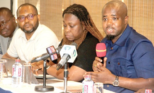 Godwin Edudzi Tameklo (right), acting Chief Executive Officer of the National Petroleum Authority,  addressing the media