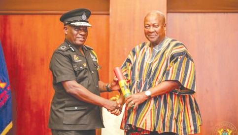 Christian Tetteh Yohuno, IGP, and President John Dramani Mahama Christian Tetteh Yohuno, IGP, and President John Dramani Mahama