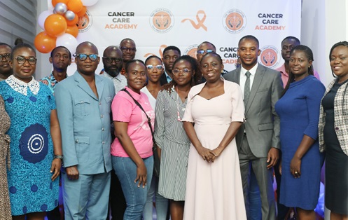 Dr Lemuel Davies Bray (3rd from right), Consultant Urologist, Trust Hospital, Tema; Dr Nana Ama Abankwa (4th from right), Chief of  Medical Staff, Trust Hospital; some staff of the hospital and invited guests after the programme. Picture: BENEDICT OBUOBI