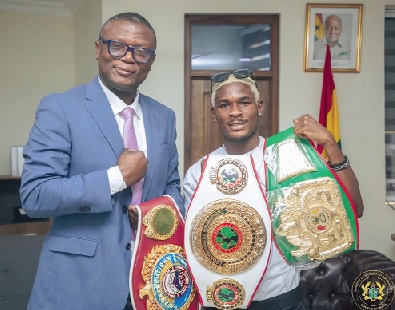 • Kofi Adams (left), Minister for Sports and Recreation, has pledged his support for Theophilus Allotey's career progress • Kofi Adams (left), Minister for Sports and Recreation, has pledged his support for Theophilus Allotey's career progress