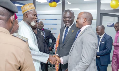 Victor Yaw Asante (2nd from right), MD, CEO of FirstBank Ghana, interacting with some guests during the opening of the Ashaiman branch of FirstBank Ghana Ltd
