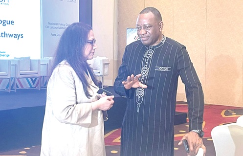 Dr Abdul-Rashid Hassan Pelpuo (right), Minister of Labour, Jobs and Employment, interacting with Manjula Luthria, a Senior Economist, World Bank, at the event