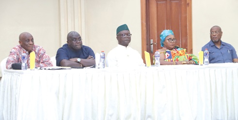 Seth Terkper (left), Presidential Adviser on the Economy, with Julius Debrah (2nd from left), Chief of Staff; Dr Alex Segbefia (right), Chief of Staff, Office of the Vice-President, and some dignitaries during the book launch in Accra. Picture: ELVIS NII NOI DOWUONA 