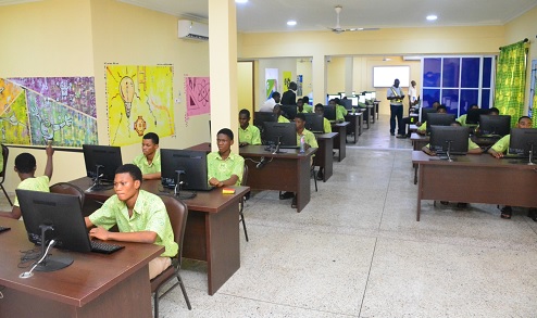 Some of the students trying their hands on the computers after the inauguration