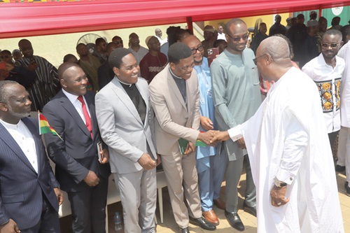 President John Dramani Mahama engaging in formal greetings with members of the clergy after the event