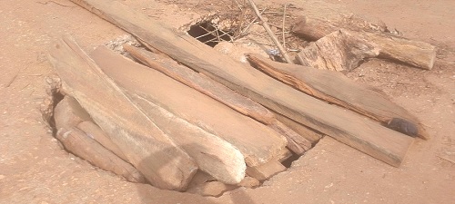 Portions of the bridge have developed holes, and have been patched with wooden slabs Portions of the bridge have developed holes, and have been patched with wooden slabs