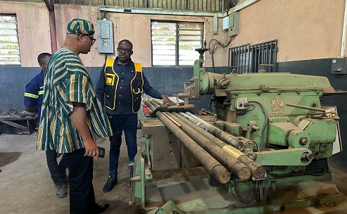 Adam Mutawakilu (left), acting Managing Director of Ghana Water Limited, inspecting pump repairs at the Central Workshop in Adam Mutawakilu (left), acting Managing Director of Ghana Water Limited, inspecting pump repairs at the Central Workshop in