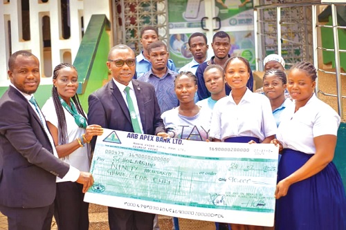 Godfred Asante Hanson (middle), CEO of the bank, with the support of Alvin Omaboe (left), Head of Business Development & Marketing, and Monica Padi (2nd from left), Head of Human Resources, presenting the cheque to the beneficiaries Godfred Asante Hanson (middle), CEO of the bank, with the support of Alvin Omaboe (left), Head of Business Development & Marketing, and Monica Padi (2nd from left), Head of Human Resources, presenting the cheque to the beneficiaries