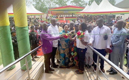 Kate Gyamfuah (middle) being assisted by Dr Winfred Ofosu (left), Osabarima Owusu Nketiah (2nd from right), Ernest Yaw Kumi (2nd from left), and Benedicta Fosu-Mensah (right) cutting the tape to inaugurate the polyclinic (inset) Kate Gyamfuah (middle) being assisted by Dr Winfred Ofosu (left), Osabarima Owusu Nketiah (2nd from right), Ernest Yaw Kumi (2nd from left), and Benedicta Fosu-Mensah (right) cutting the tape to inaugurate the polyclinic (inset)