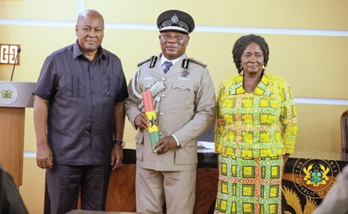 President Mahama (left) and Vice-President Prof. Naana Jane Opoku-Agyemang (right) with IGP Christian Tetteh Yohuno after the ceremony President Mahama (left) and Vice-President Prof. Naana Jane Opoku-Agyemang (right) with IGP Christian Tetteh Yohuno after the ceremony