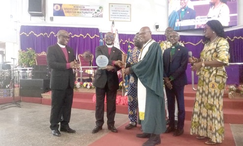 Rt Rev. Dr William Mpere Gyekye (2nd from left), Administrative Bishop of the church, presenting a memento to Emmanuel Nii Laryea, First Lay Chairman of the Tema Diocese. With them are Rt Rev. Samuel Ofori Akyea (left), Bishop of the Tema Diocese of the Methodist Church Ghana, and Gladys Entsuah (right), a Steward of the Bethel Methodist Church, Tema Community 8 Rt Rev. Dr William Mpere Gyekye (2nd from left), Administrative Bishop of the church, presenting a memento to Emmanuel Nii Laryea, First Lay Chairman of the Tema Diocese. With them are Rt Rev. Samuel Ofori Akyea (left), Bishop of the Tema Diocese of the Methodist Church Ghana, and Gladys Entsuah (right), a Steward of the Bethel Methodist Church, Tema Community 8