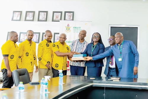Kwasi Kyere (middle) leads the Ghacem delegation to hand over the equipment to Prof. Rita Akosua Dickson (3rd from right) on behalf of the department Kwasi Kyere (middle) leads the Ghacem delegation to hand over the equipment to Prof. Rita Akosua Dickson (3rd from right) on behalf of the department