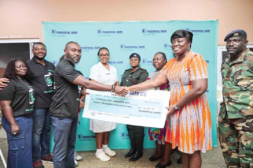 Bennet Frimpong (left), Head of Public Relations at Prudential Bank, presenting the cheque to Dr Sheila Asamoah Okyere, acting Head of the Paediatric Department of 37 Military Hospital Bennet Frimpong (left), Head of Public Relations at Prudential Bank, presenting the cheque to Dr Sheila Asamoah Okyere, acting Head of the Paediatric Department of 37 Military Hospital