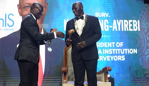 Dr Anthony Arko-Adjei (left), outgone president, Ghana Institution of Surveyors, symbolically handing over to Kofi Obeng-Ayirebi, his successor, during the investiture. Picture: BENEDICT OBUOBI Dr Anthony Arko-Adjei (left), outgone president, Ghana Institution of Surveyors, symbolically handing over to Kofi Obeng-Ayirebi, his successor, during the investiture. Picture: BENEDICT OBUOBI