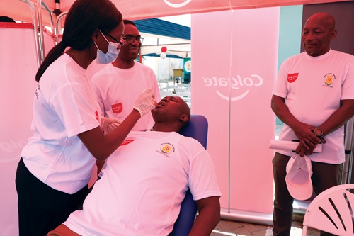 Prof. Samuel Kaba Akoriyea (2nd from right), acting Director-General, Ghana Health Service, going through the oral health screening process. Picture: EDNA SALVO KOTEY 