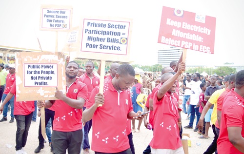 Some workers displaying their placards at the ceremony Some workers displaying their placards at the ceremony