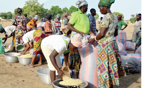 Some of the beneficiaries sharing the food items Some of the beneficiaries sharing the food items