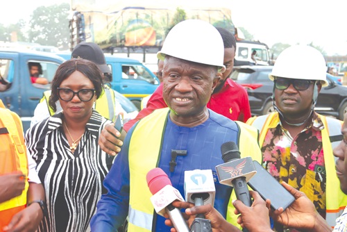 A section of the ongoing Pokuase-Nsawam Highway project. INSET: Isaac Adjei Mensah, Chairperson, Parliamentary Select Committee on Roads and Transportation, speaking to journalists after the inspection. Picture: ELVIS NII NOI DOWUONA A section of the ongoing Pokuase-Nsawam Highway project. INSET: Isaac Adjei Mensah, Chairperson, Parliamentary Select Committee on Roads and Transportation, speaking to journalists after the inspection. Picture: ELVIS NII NOI DOWUONA