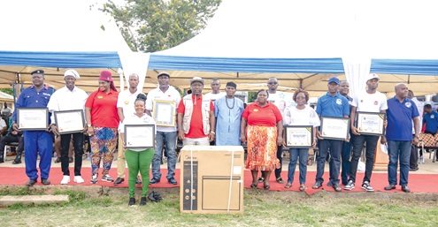 James Gunu (7th from right), Volta Regional Minister, with the awardees James Gunu (7th from right), Volta Regional Minister, with the awardees