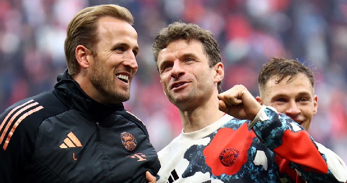 Bayern Munich's Harry Kane (left) and Thomas Muller react after the match Bayern Munich's Harry Kane (left) and Thomas Muller react after the match