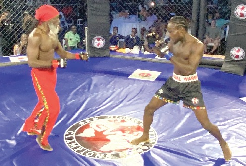 • Reggie Rockstone (left) staged a thrilling comeback from an early knockdown to secure a second-round victory over the younger William Adom Nortey • Reggie Rockstone (left) staged a thrilling comeback from an early knockdown to secure a second-round victory over the younger William Adom Nortey