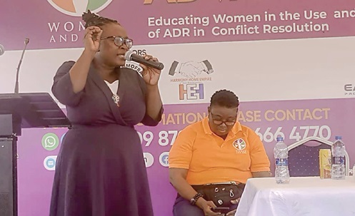 Serwaa Danquah (standing), the Greater Accra Regional Coordinator, ADR, addressing the gathering Serwaa Danquah (standing), the Greater Accra Regional Coordinator, ADR, addressing the gathering