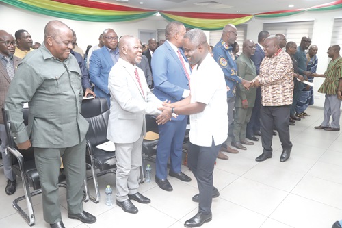 Kwabena Mintah Akandoh (arrowed), Minister of Health, congratulating board members of the various health institutions after the swearing-in ceremony in Accra. Picture: SAMUEL TEI ADANO Kwabena Mintah Akandoh (arrowed), Minister of Health, congratulating board members of the various health institutions after the swearing-in ceremony in Accra. Picture: SAMUEL TEI ADANOKwabena Mintah Akandoh (arrowed), Minister of Health, congratulating board members of the various health institutions after the swearing-in ceremony in Accra. Picture: SAMUEL TEI ADANO