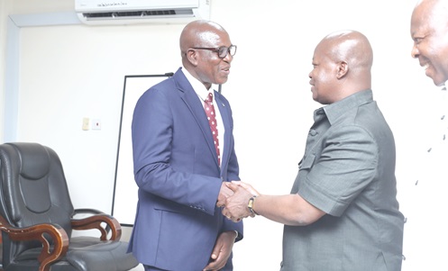 John Wumborti (left), acting Commissioner, Aircraft Accident and Incident Investigation and Prevention Bureau, interacting with Prof. Ahmed Nuhu Zakariah (middle), CEO, Ghana Ambulance Service, at the meeting in Accra. Picture: BENEDICT OBUOBI