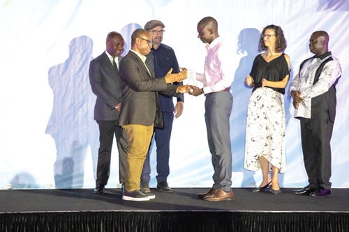 Timothy Ngnenbe (3rd from right) receiving the best news report award from Emmanuel Dogbevi (2nd from left), Investigative Journalist, during World Press Freedom Day, 2025. With them are Felix Kwakye Ofosu (left), Minister of Government Communications; Daniel Krull (3rd from left), German Ambassador; Albert Kwabena Dwumfour (right), President of the Ghana Journalists Association, and Harriet Thompson (2nd from right), British High Commissioner. Picture: ESTHER ADJORKOR ADJEI Timothy Ngnenbe (3rd from right) receiving the best news report award from Emmanuel Dogbevi (2nd from left), Investigative Journalist, during World Press Freedom Day, 2025. With them are Felix Kwakye Ofosu (left), Minister of Government Communications; Daniel Krull (3rd from left), German Ambassador; Albert Kwabena Dwumfour (right), President of the Ghana Journalists Association, and Harriet Thompson (2nd from right), British High Commissioner. Picture: ESTHER ADJORKOR ADJEI
