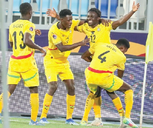 oseph Opoku (with hands raised) is joined by his teammates to celebrate Ghana's winning goal against the Central African Republic today oseph Opoku (with hands raised) is joined by his teammates to celebrate Ghana's winning goal against the Central African Republic today